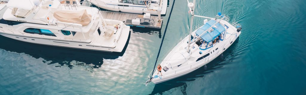 Sailboat leaving the dock