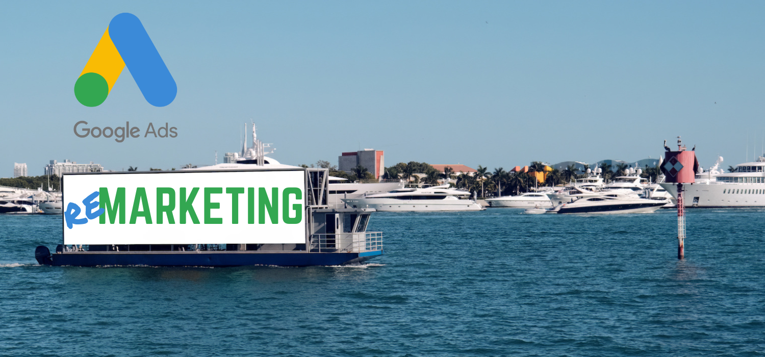 boat near the docks with "remarketing" sign on the side