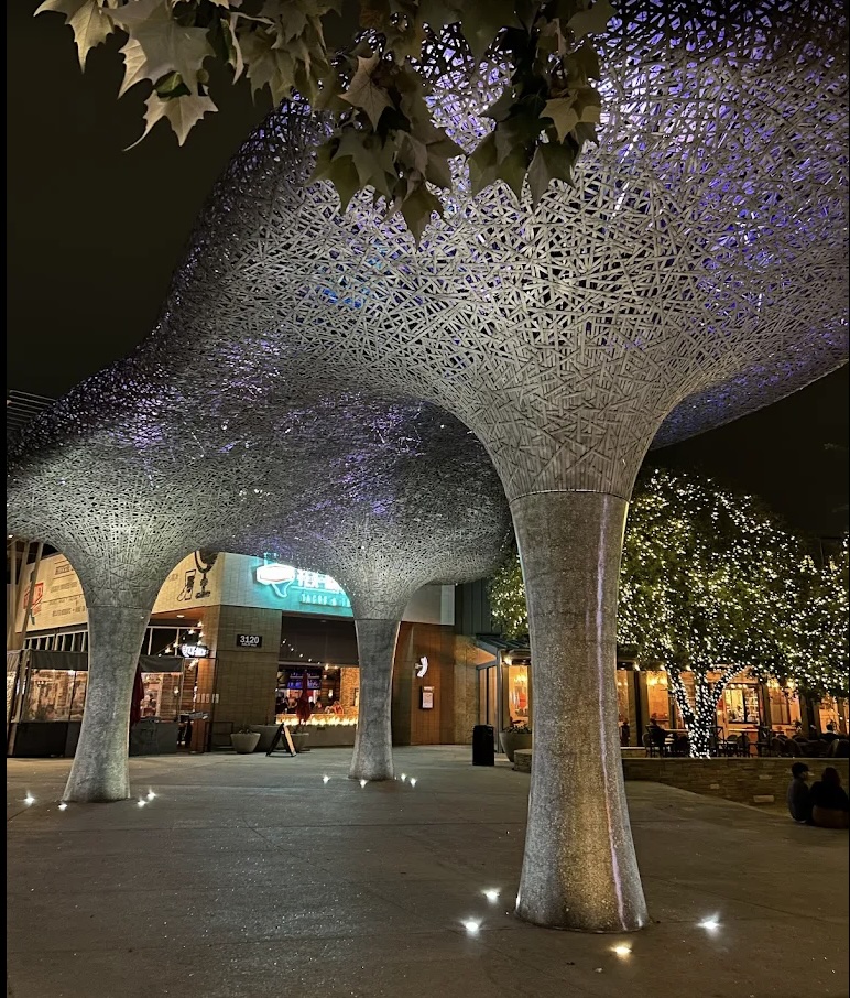 AI edited version of a sculpture of a tree in the North Austin Domain area.
